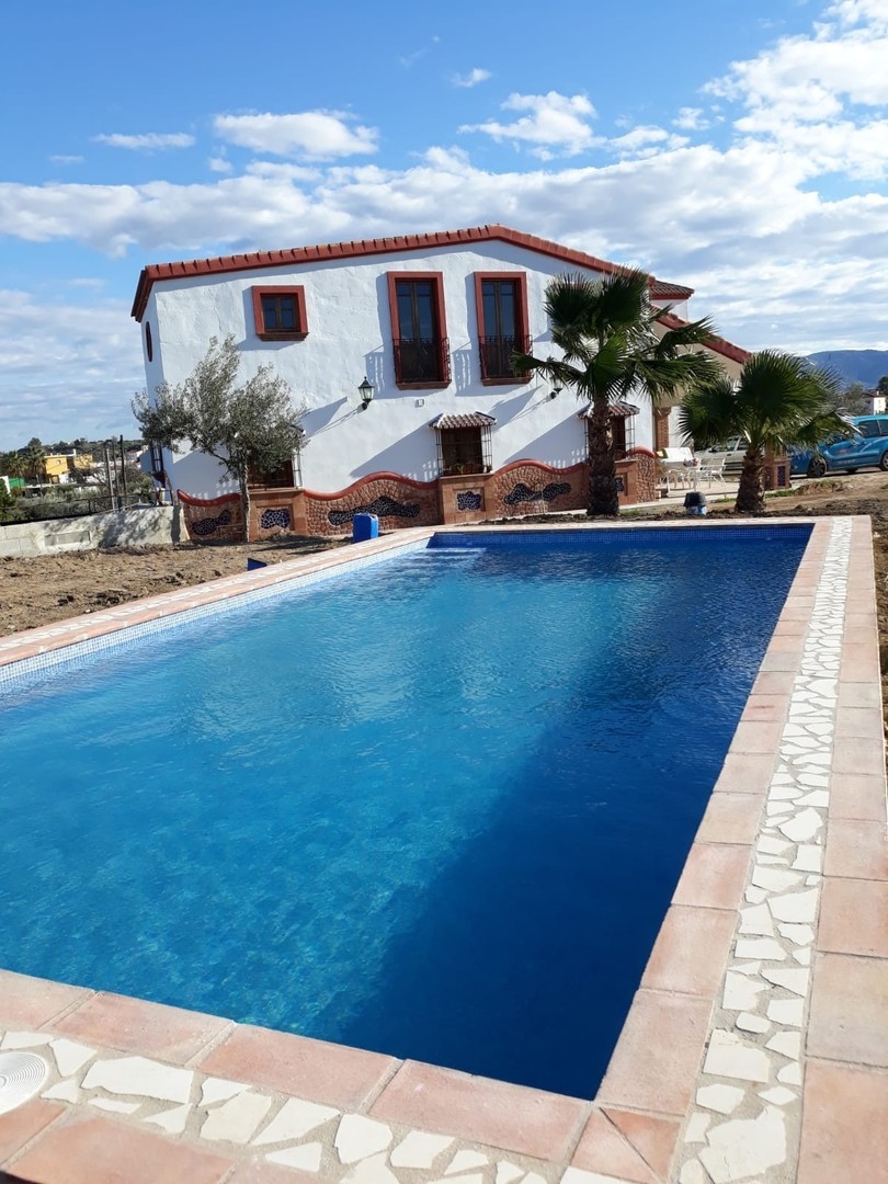 2651-V For sale a fantastic  14.000m2 fenced plot with  3 different properties  (urban and rustic).
